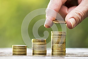 Financial freedom concept, hand and money coins