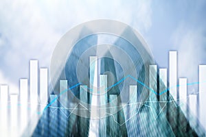 Financial graphs and charts on blurred business center background. Invesment and trading concept.