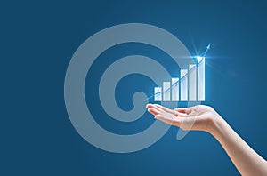 Financial growth chart in his hand.