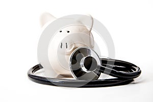 Financial Health - Black Stethoscope & Piggy Bank