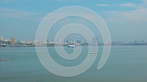 Financial Indian capital Mumbai skyline, fishermen boats and Bandra–Worli Sea Link bridge, Mumbai, Maharashtra, India