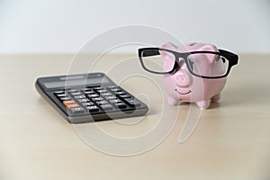 Financial insurance piggy bank with calculator Retirement Plan and Pension