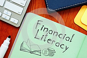 Financial literacy is shown on the business photo using the text