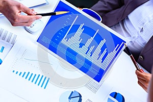 Financial paper charts and graph