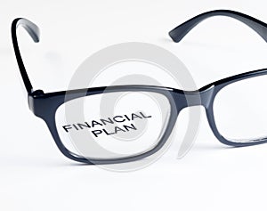 Financial plan words see through glasses lens, business concept