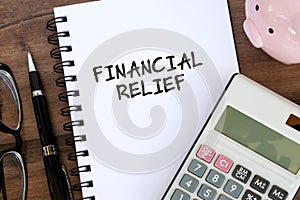 Financial Relief text on note pad