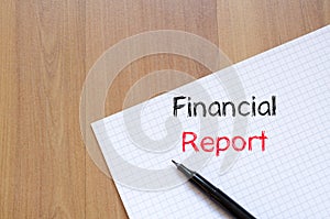 Financial report text concept on notebook