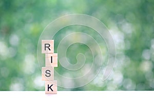 Financial risk assessment.Risk word on natural green background, Business investment and Risk management concept