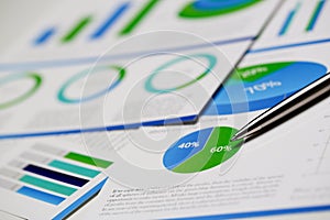 Financial statistics documents ball pen infographics