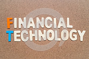 Financial Technology wording on brown background