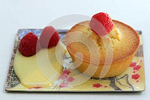 Financier with raspberries