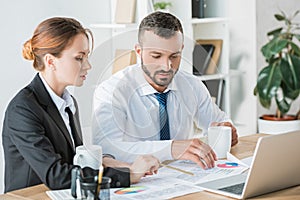 financiers working during coffee break photo