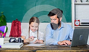 Find buddy to help you study. Private lesson. School teacher and schoolgirl with laptop. Study modern technologies. Man