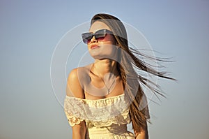 Find inner strength. Girl in sunglasses copy space. Freedom. Carve out time for yourself. Harmony and balance. Female