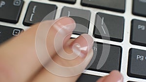 Find match button on computer keyboard, female hand fingers press key