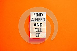 Find a need and fill it symbol. Concept words Find a need and fill it on wooden blocks on a beautiful orange table orange