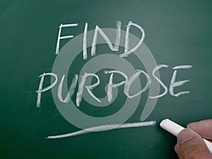 Find purpose, word text written on chalkboard, motivational inspirational quote