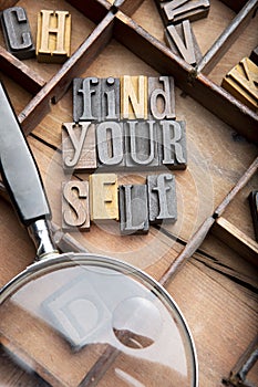 Find yourself in wooden typeset letters
