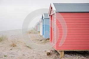 Findhorn, Scotland - July 2016: Colourful beach huts along the coast at Findhorn Bay in Northern Scotland