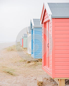 Findhorn, Scotland - July 2016: Colourful beach huts along the coast at Findhorn Bay in Northern Scotland