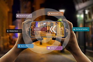 Finding hotels and other tourist facilities in the city with 3d navigation app based on augmented reality technology concept