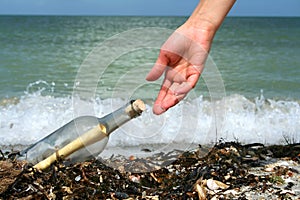 Finding a message in a bottle photo