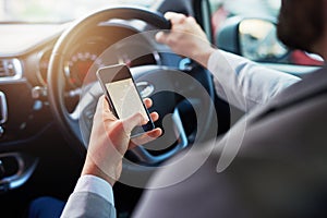 Finding the quickest route with his phone. Closeup shot of an unrecognizable man using his cellphone to find directions