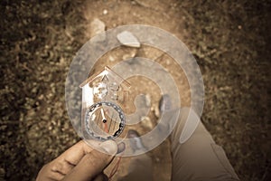 Finding the right position in the forest with a compass, vintage