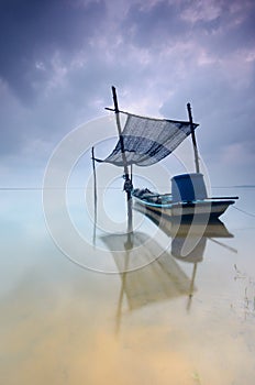 Jubakar beach at tumpat kelantan, Malaysia- A fisherman boat parked and ready to work in the seaÃÂ  in kelantan. photo