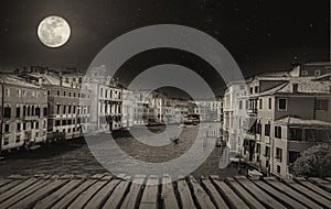Fine art retro image with gondola on Canal Grande, Venice, It