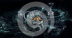 Wedding Ring floating in water photo