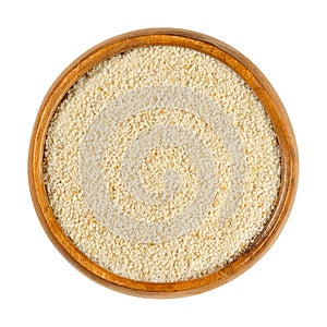 Fine breadcrumbs, also breading or crispies in wooden bowl