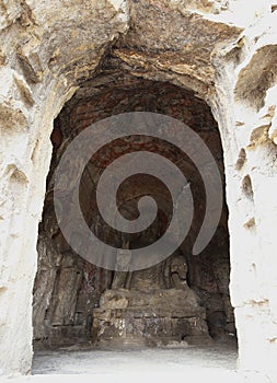 The fine Buddha statues of the longmen grottoes are carved on the cliff in the mountains