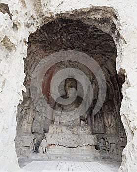 The fine Buddha statues of the longmen grottoes are carved on the cliff in the mountains