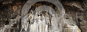 The fine Buddha statues of the longmen grottoes are carved on the cliff in the mountains