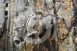 The fine Buddha statues of the longmen grottoes are carved on the cliff in the mountains