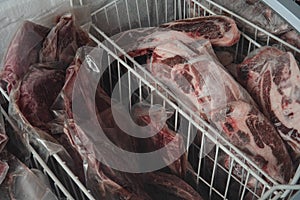 Fine cuts of meat in a fridge accommodated