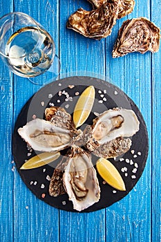 Fine de claire oysters with lemon and white wine