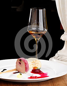 Fine dining, Goose Foie gras with black garlic and raspberry jelly