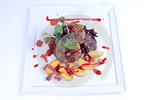 Fine dining meal -Roast duck with apples cranberry