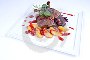 Fine dining meal -Roast duck with apples cranberry