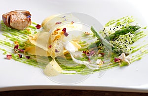 Fine dining, ravioli with asparagus and Porcini