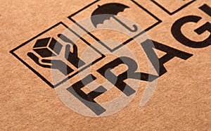 Fine image close up of fragile symbol on cardboard