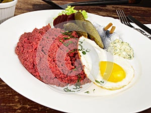 Fine Meat - Labskaus - Served with Beetroot Fried eggs, Herring and Pickles