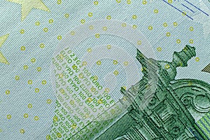 Fine microprint on hundred euro banknote protection against counterfeit photo