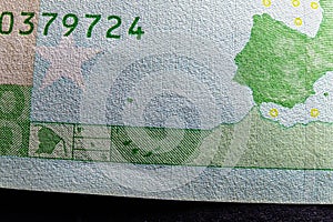 Fine microprint and serial number on hundred euro banknote protection against fraud
