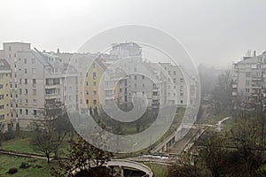 Fine particulate matter air in the city and PM2.5 dust. Cityscape of buildings with bad weather from Fine Particulate Matter. Air