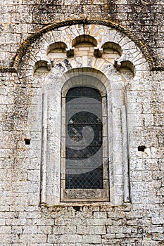 Fine romanesque window in the church of Saint Amand de Coly Fran