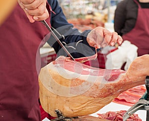 Fine serrano ham at food market