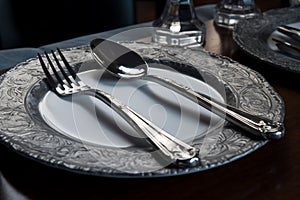 Fine silverware display, knife, fork, spoon, and plate for dining